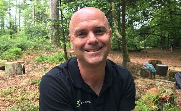 Gareth from Active Devon smiling in a forest